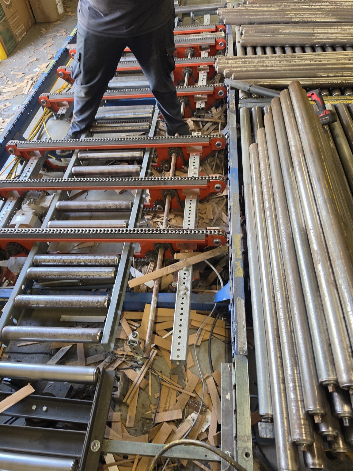 Conveyor system disassembled for repair